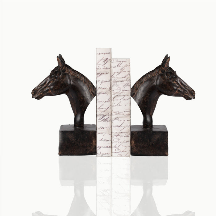 Two horsehead bookends, two books