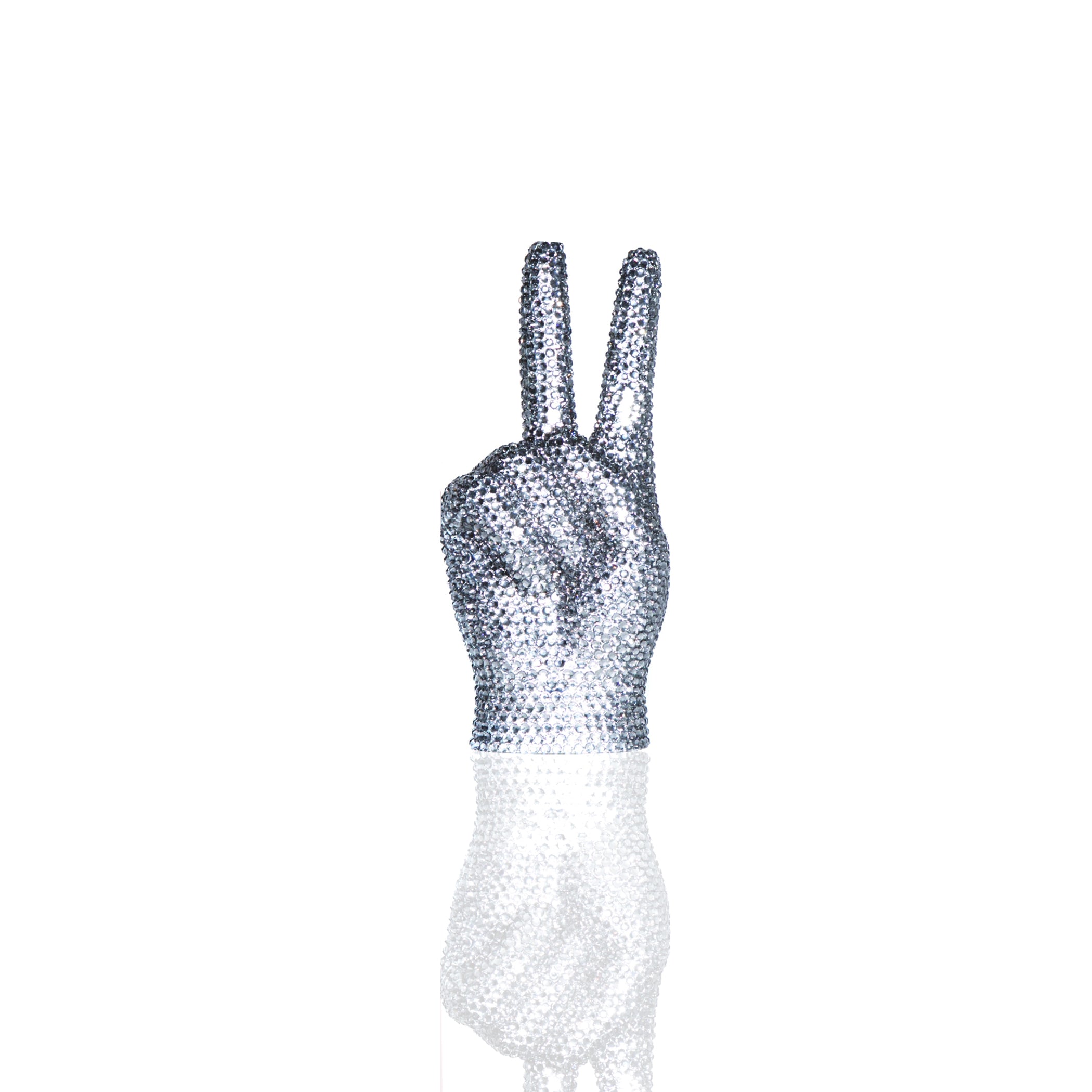 Peace sign hand sculpture